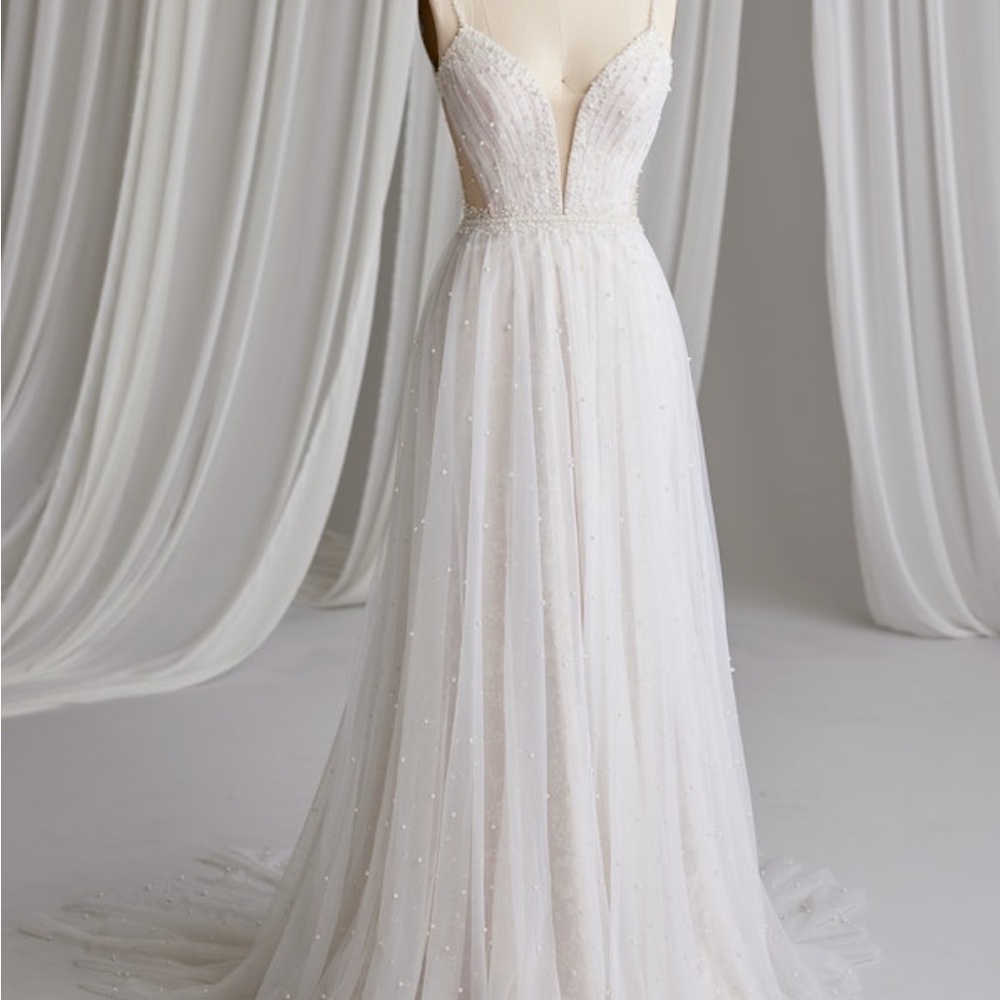 Elegant White Beaded Gown